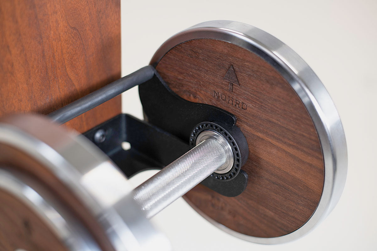 Držiak na činky s bezpečnostným zaistením